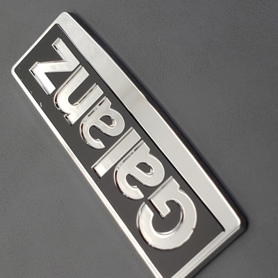 Logo personalizzato in nicchia in rilievo Logo in metallo elettroformato per imballaggio Stampa diretta